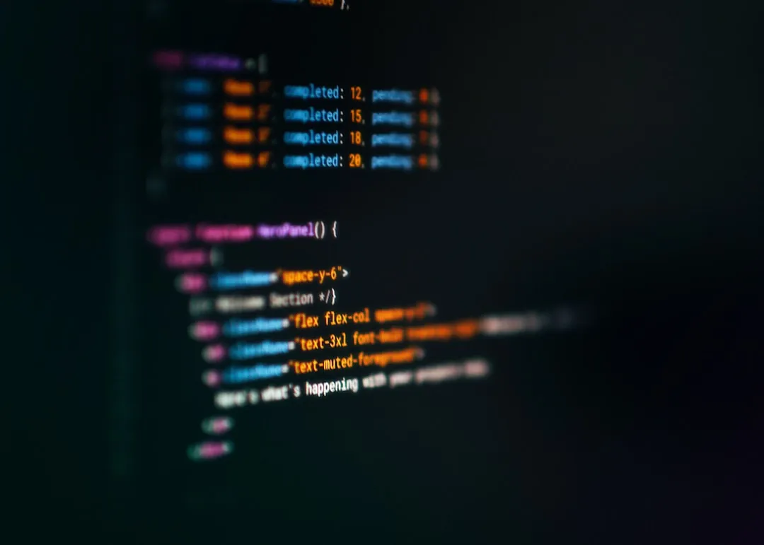 computer screen displaying colorful code snippets